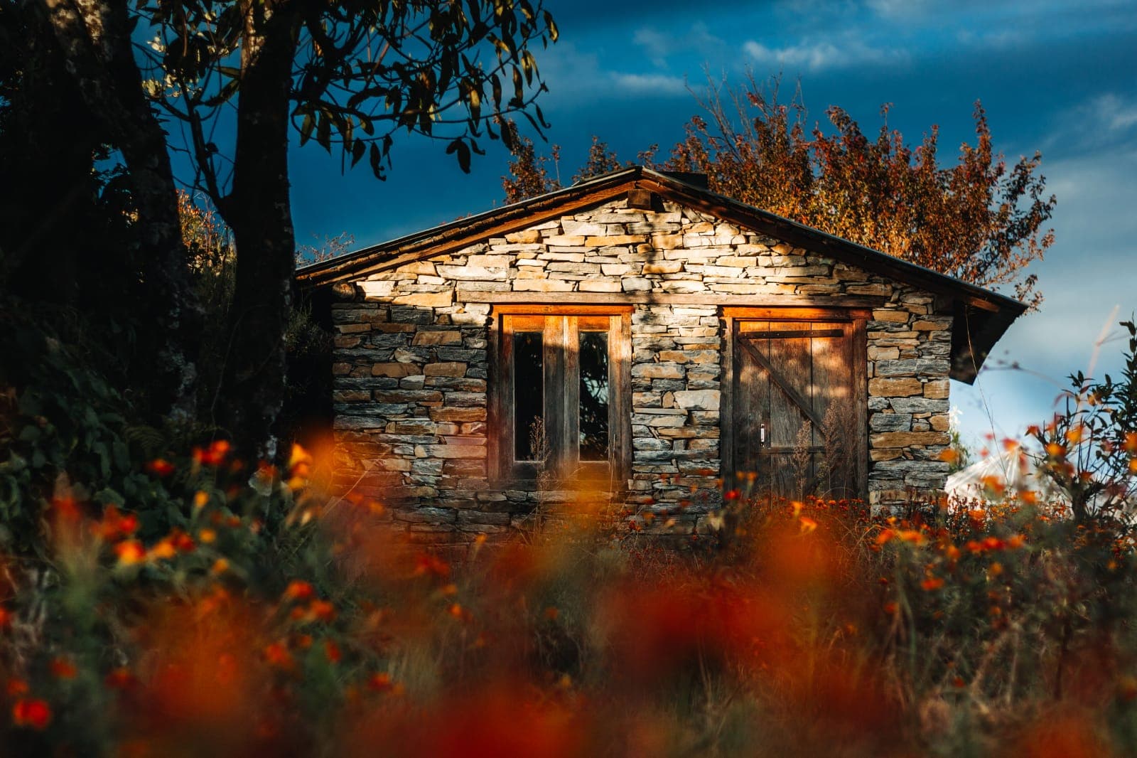 Stone cottage in autumn